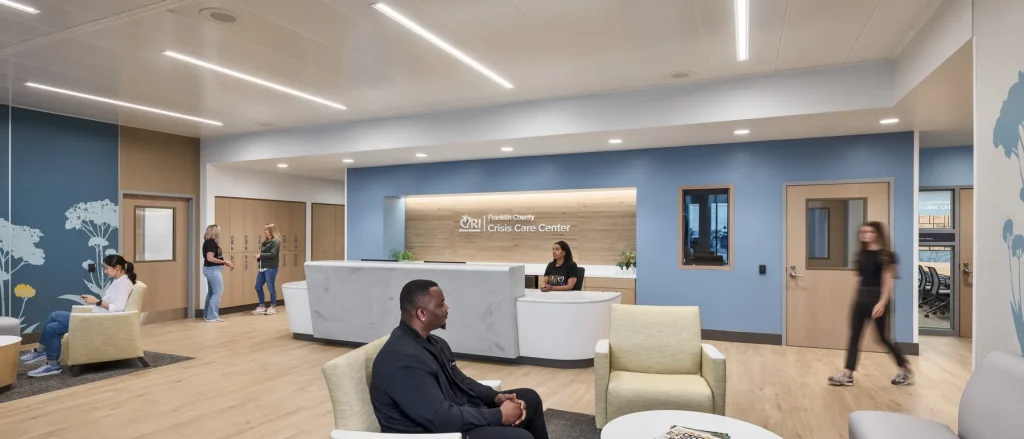 Crisis centre lobby with soft seating and a reception desk