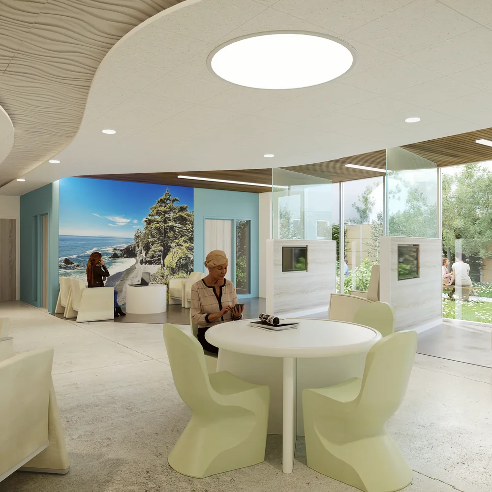 EmPATH unit with recliners, a round table and a landscape mural